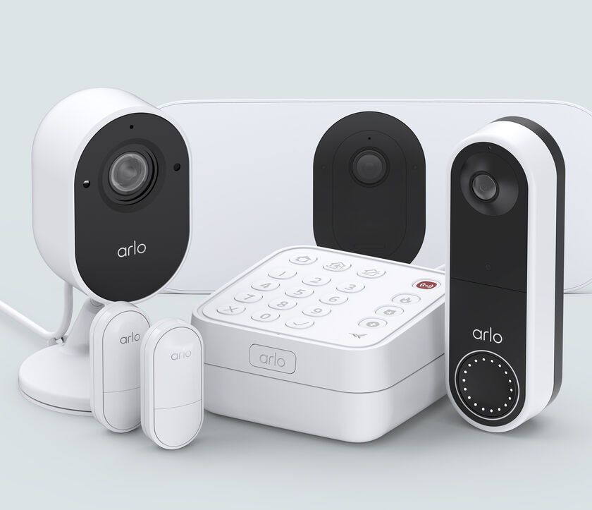 Security System with 2 Sensors, Wireless Doorbell, Essential Indoor Camera & Floodlight Bundle, in white, facing front